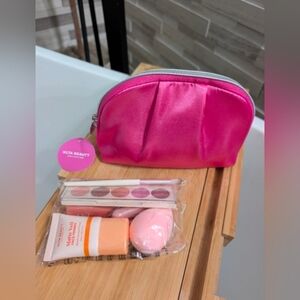 Ulta Beauty Collection 9-piece makeup set with a small pink cosmetic bag. 
NEW
